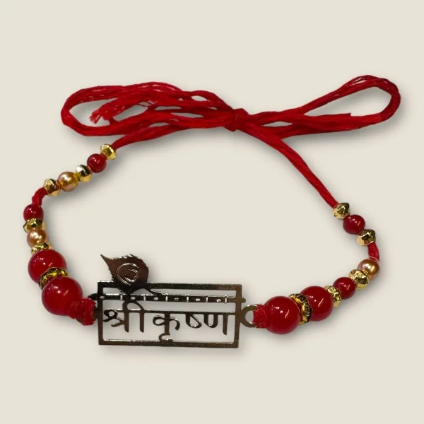 BEAUTIFUL SILVER THRED RAKHI WITH LOVELY DESIGN (SHREE KRISHNA)