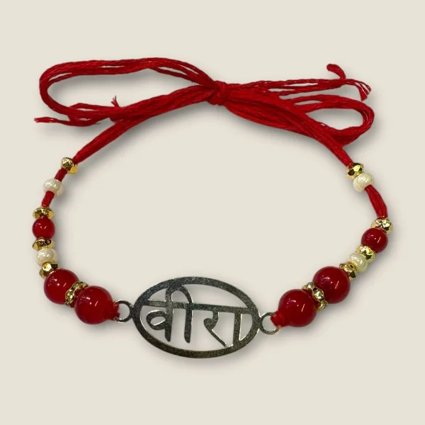 BEAUTIFUL SILVER THRED RAKHI WITH LOVELY DESIGN