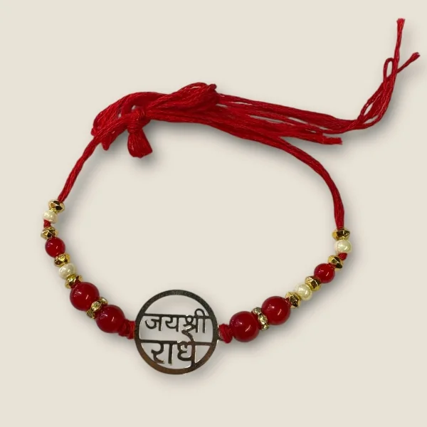 BEAUTIFUL SILVER THRED RAKHI WITH LOVELY DESIGN