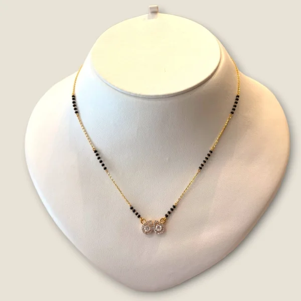 DOUBLE THE CHARMA WITH LIGHT WAITED GOLD MANGALSUTAR | MSS419