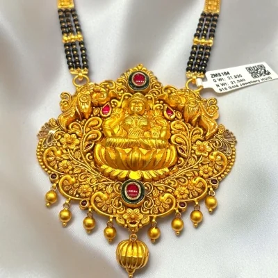 WEAR THE BLESSINGS OF MAA LAXMI WITH OUR TEMPLE-INSPIRED MANGALSUTRA PENDANTS, 916 HUID HALLMARK GOLD | ZMS164
