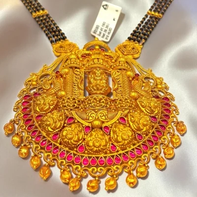 TIMELESS GOLD ARTISTRY MEETS SACRED MARRIED BLISS IN EVERY GODDESS LAXMI MANGALSUTRA PENDANT. | MS580