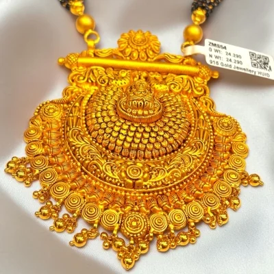 THE PINNACLE OF TRADITION.EXCLUSIVE GOLD LAXMI MANGALSUTRA PENDANTS. 916 HUID HALLMARK GOLD | ZMS54