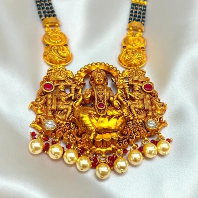 THE AUSPICIOUS UNION OF PURE GOLD, BLACK BEADS, AND DIVINE LAXMI BLESSINGS. 916 HUID HALLMARK GOLD |